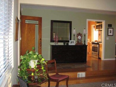 A step down takes you into the formal living area 
