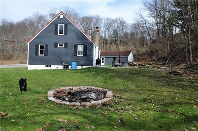 Side of home with firepit for chilling on any old