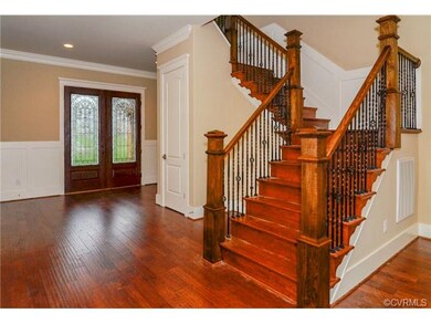 Foyer with lovely mill work details and 10 ft ceil