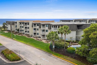 View of property featuring a water view
