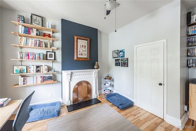 Multi-purpose room featuring wood finished floors