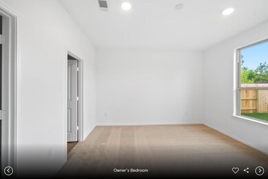 Empty room featuring recessed lighting