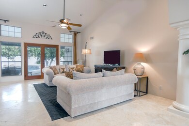 Travertine flooring throughout