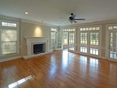 Located just off kitchen, with wet bar, double Fre