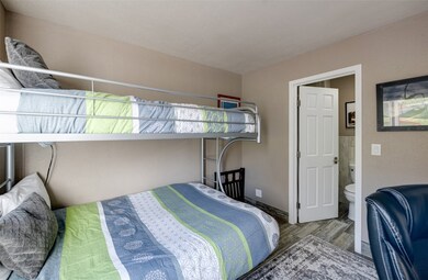 Bedroom with wood finished floors