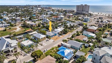 Aerial perspective of suburban area with a large body of water