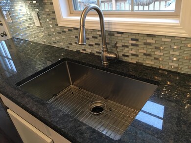 6 - Granite with Stainless Sink