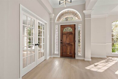 Private study on one side of the entry and a spaci