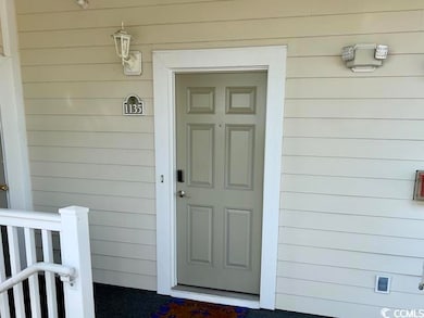 This inviting corner unit boasts a bright, well-li