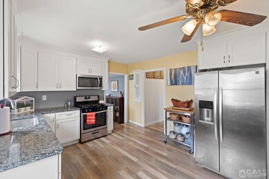 Eat in kitchen with stainless steel appliances