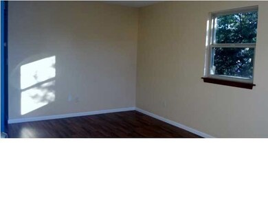 Living room with new wood laminate flooring