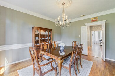 Flooded with abundant natural light, the formal di
