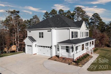 Extended garage can accommodate a boat or truck.