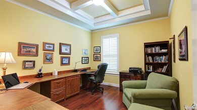 Third bedroom currently used as an office. Coffere