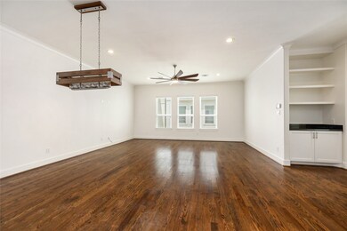 Another view of this well-lit living and dining ar