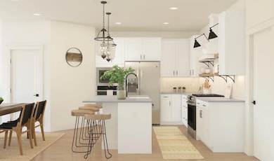 Kitchen with island, pendant lighting and open shelving