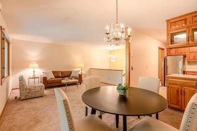 Spacious and open floor plan offering convenient access to the living, dining, and kitchen areas.