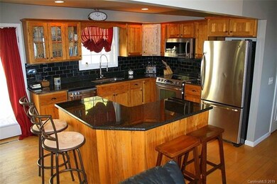 Granite Tops, Hand Planed Wormy Chestnut Cabinets 