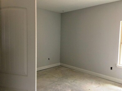 A view of the 3rd bedroom is seen here.