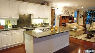 Bright white cabinets, granite countertops, large 