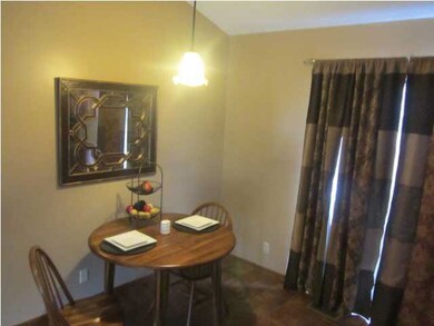 Door off the dining room and kitchen opens to larg