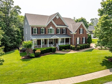 Nestled on a quiet, tree-lined lot in the sought-a