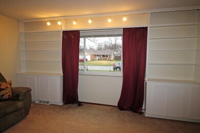 Picture window flanked by built-ins