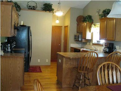 Kitchen with wood floors, pantry and plenty of cou