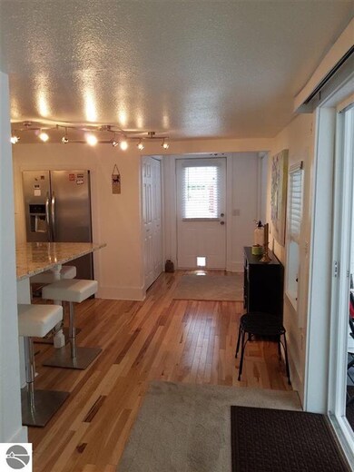 301 Ames St, Elk Rapids, MI 49629 - photo 5