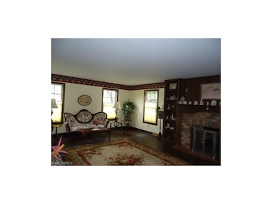 Lovely Living Room 20x16 has a hardwood floor