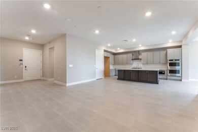 Kitchen with double oven, wall chimney exhaust hoo