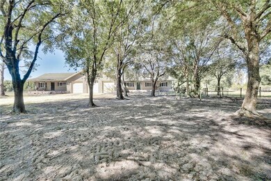Mature trees adding to the charm of this property