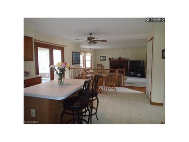 Opposite view of the kitchen and into the family r