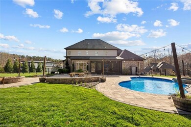 Backyard swimming pool, hot tub, hardscaping, fire pit, dining space, screened porch!