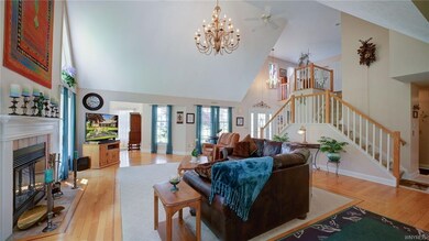 The Great room has hardwood flooring with inset ca
