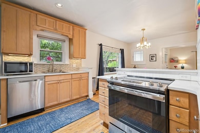 Quartz countertops, classic backsplash.