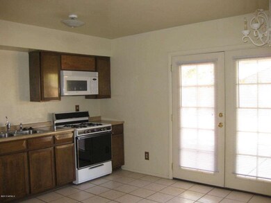 KITCHEN W/FRENCH DOORS TO PATIO