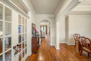Open entryway with office and formal dining