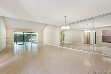 Great Room Features Sliding Doors to the Fully Enc
