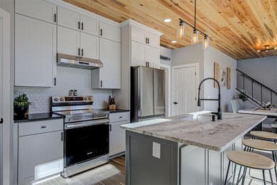 Spacious kitchen with bar seating