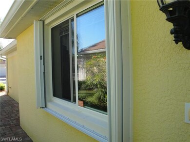 Home features accordion shutter on all windows.