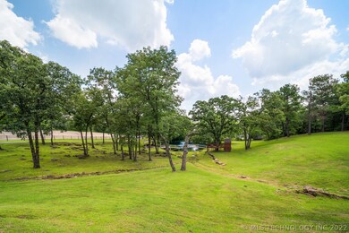 Beautiful views of 2 acres m/l with pond stocked w