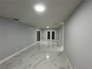 Hall featuring french doors