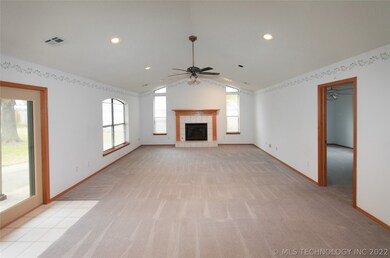 Great room with fireplace, cathedral ceiling & Fre