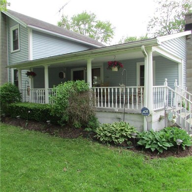 Front covered porch. Enjoy those long summer eveni