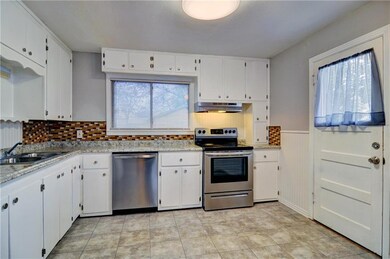Brand new Electric Stove and Dishwasher.  The kitc
