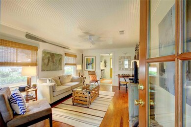 Look at those gorgeous heart pine floors.