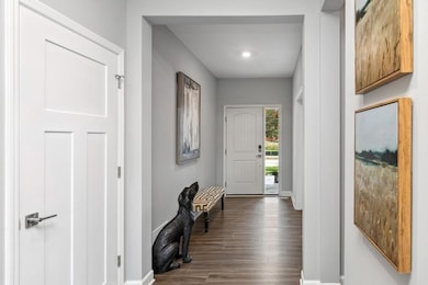 Photo is of the actual home. Make the best first impression with this bright and open foyer.