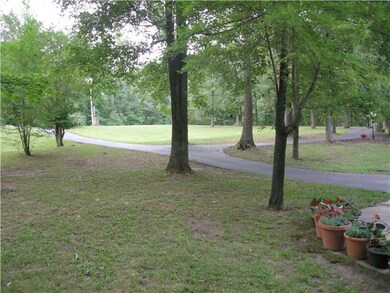 This view of the front yard reveals the long circu
