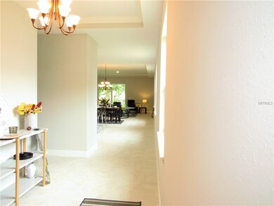 Large Foyer with view throughtout home.  Custom li